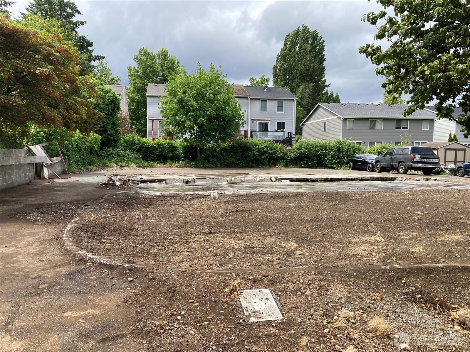 1201 E Street Southeast Lacey, WA 98503 - Photo 2 of 4 a front view of a house with a yard and garage