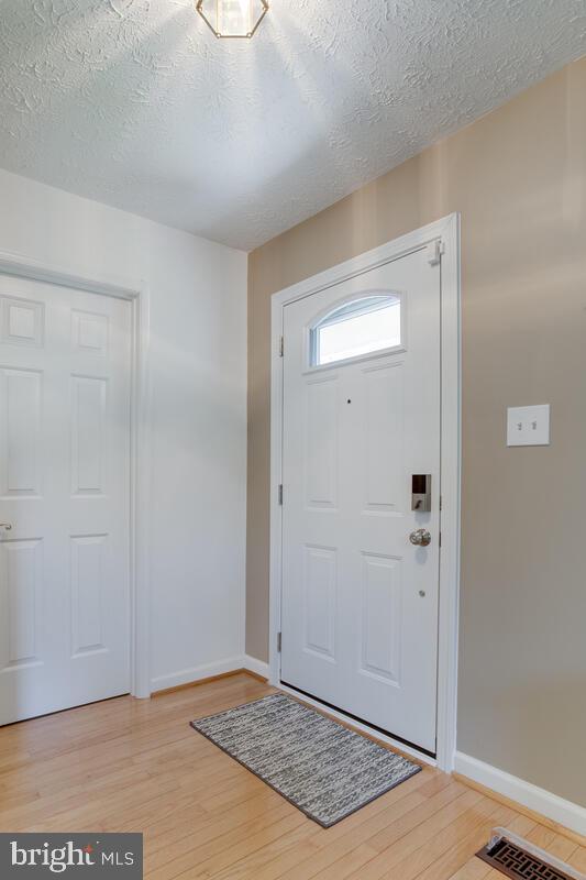 6402 Hanover Crossing Way Hanover, MD 21076 - Photo 4 of 49 NEW high tech Entry door & Storm door.