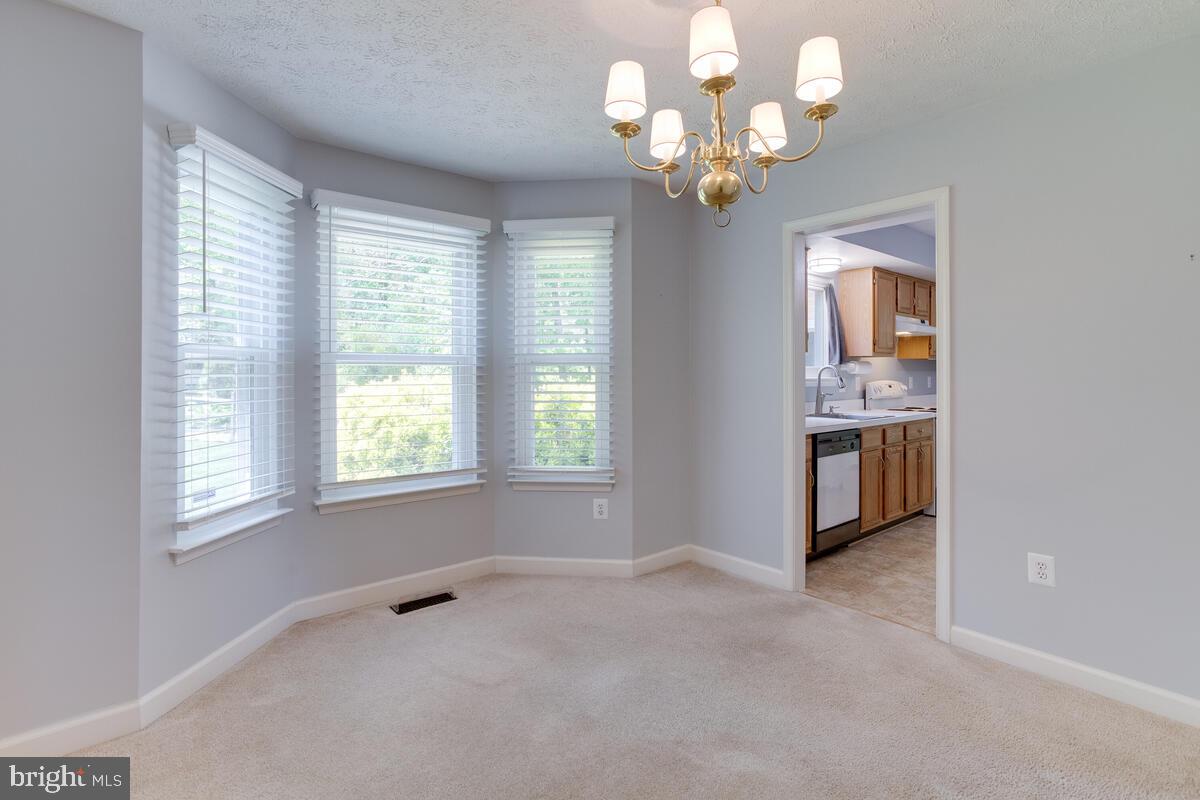 6402 Hanover Crossing Way Hanover, MD 21076 - Photo 9 of 49 Formal Dining Rm w/ Bump Out