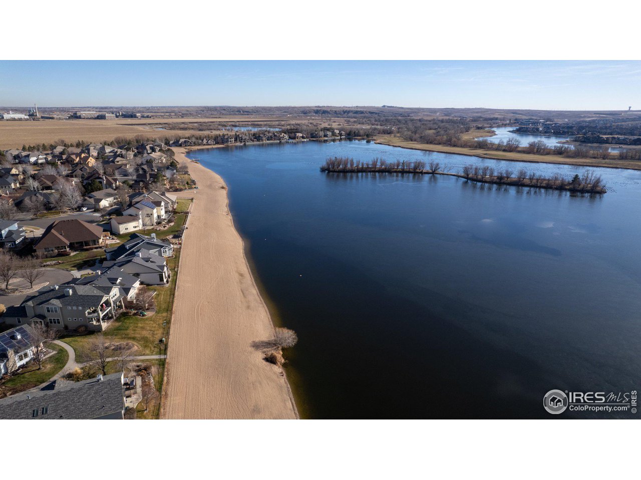 1515 Waterfront Drive Windsor, CO 80550 - Photo 2 of 40 Sandy beaches surround the five lakes