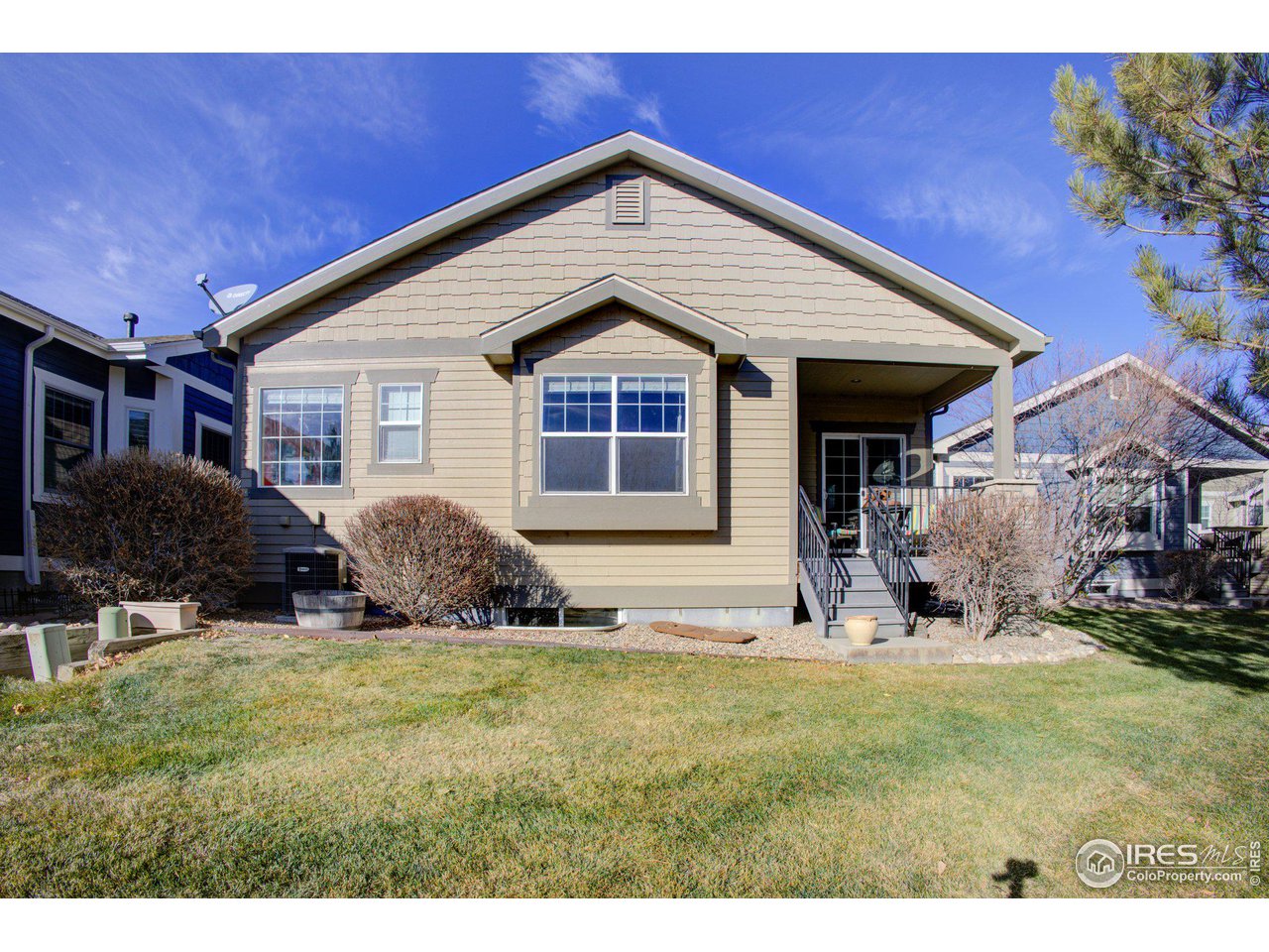 1515 Waterfront Drive Windsor, CO 80550 - Photo 34 of 40 Walk off the rear deck onto the sand walkway right over to Rock Bridge Lake and beyond