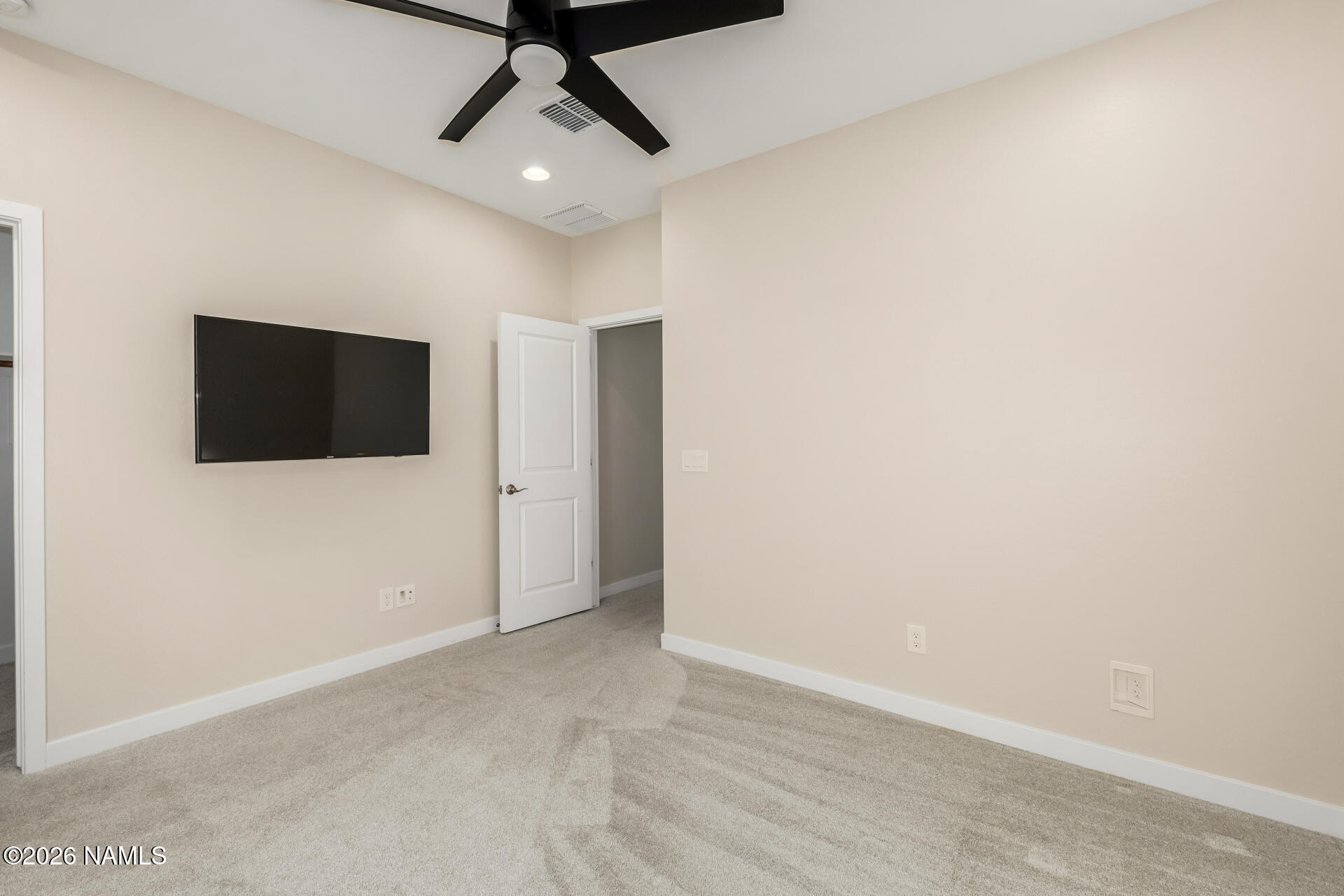 6413 North 17th Street Phoenix, AZ 85016 - Photo 17 of 26 a view of a livingroom with a flat screen tv