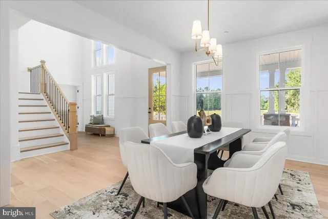 a view of a room with rack on the wall and a window