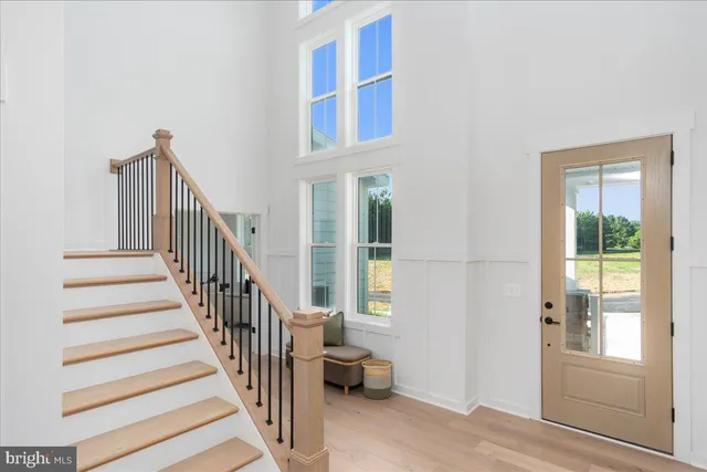 a dining room with furniture window and outside view