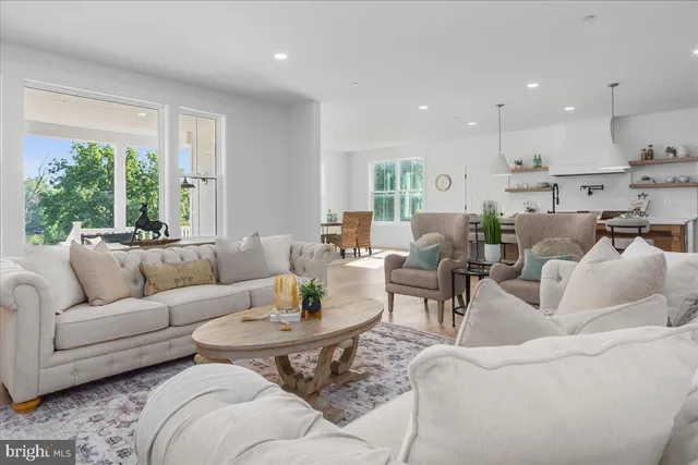 a living room with furniture and window