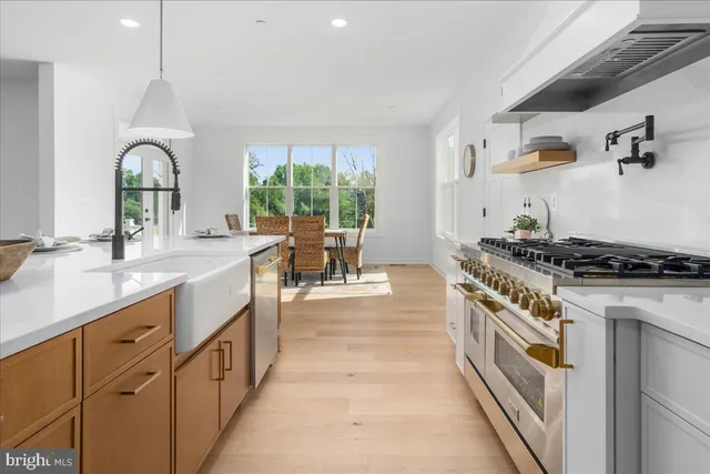 a bedroom with a bed and a wall painting