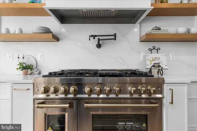 a white bath tub sitting in a bathroom
