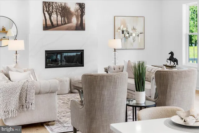 a view of a hallway with a livingroom