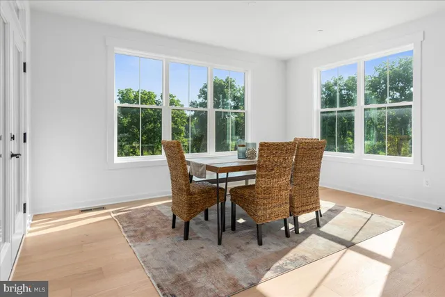 a bathroom with a sink toilet a mirror and shower