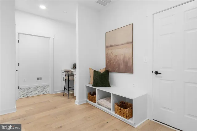 an aerial view of a house with garden space and lake view