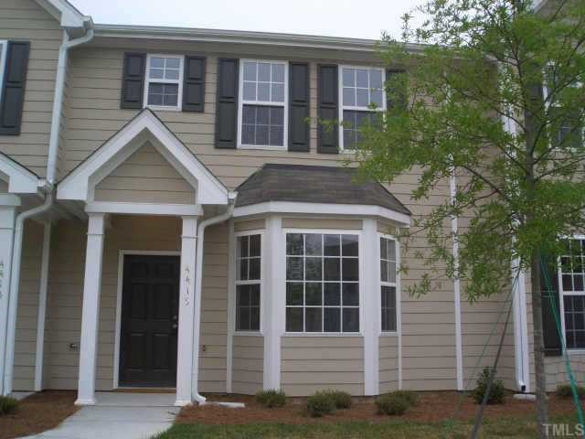 4415 Log Cabin Drive Raleigh, NC 27616 - Photo 10 of 10 Beautiful 4415 Log Cabin Drive welcomes you home! Based on the Birch floor plan, lovely landscaping and a covered entry showcase your front door. See the HardiPlank siding? 50 year warranty! (Accompany photos may vary from actual townhouse.) Exterior Front