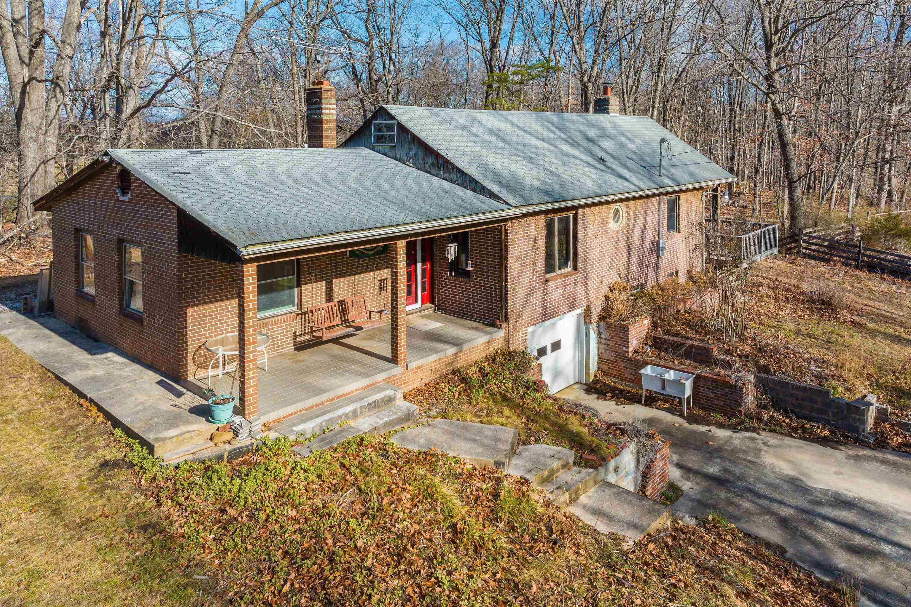 2219 Hewitt Road Swoope, VA 24479 - Photo 19 of 53 a view of a house with wooden fence