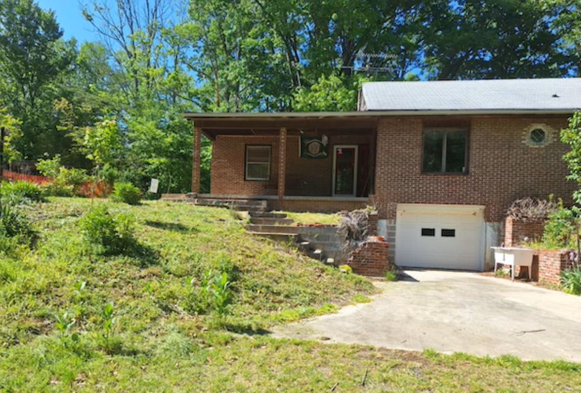 2219 Hewitt Road Swoope, VA 24479 - Photo 20 of 53 a front view of a house with a yard
