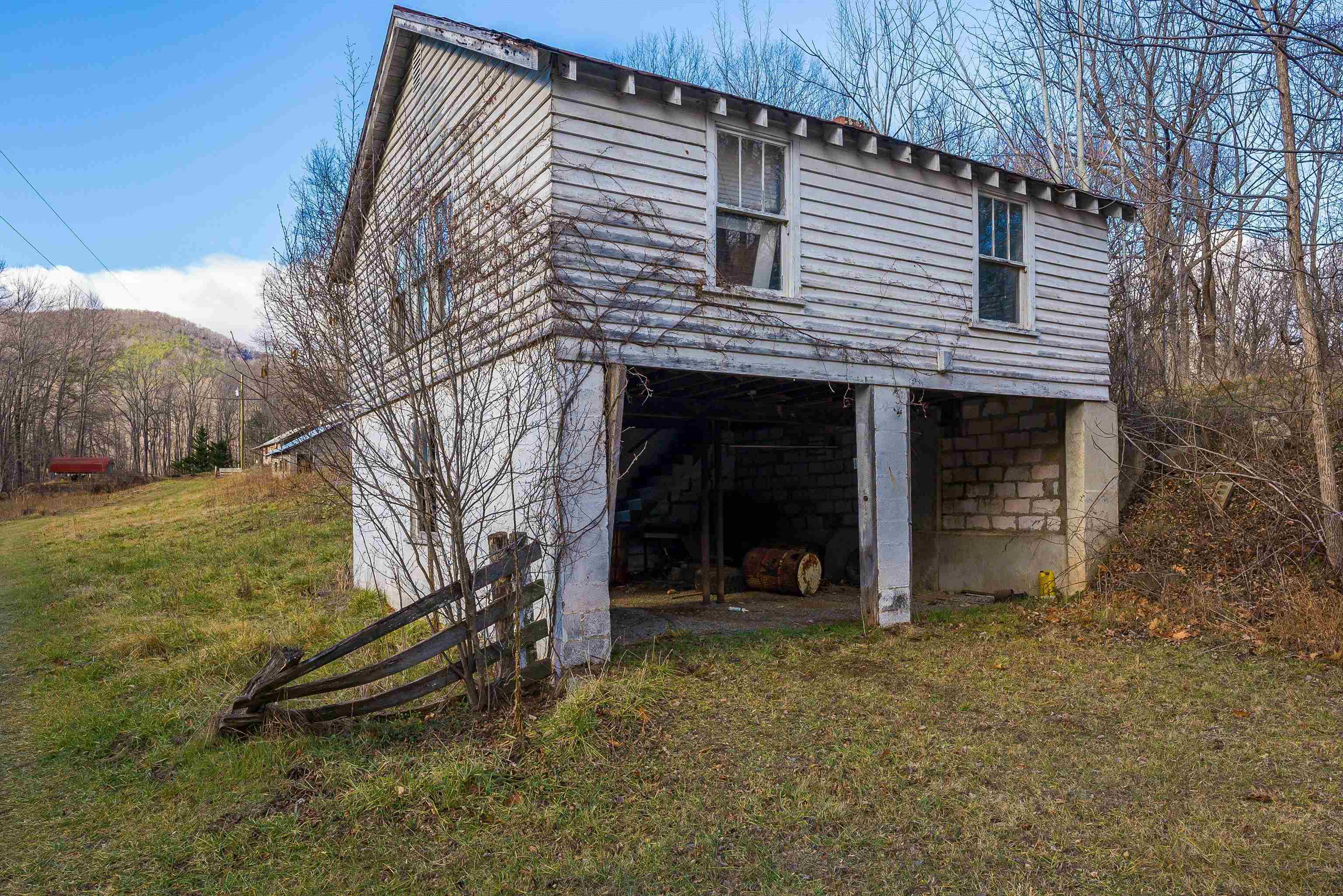 2219 Hewitt Road Swoope, VA 24479 - Photo 22 of 53 a view of a house with a yard