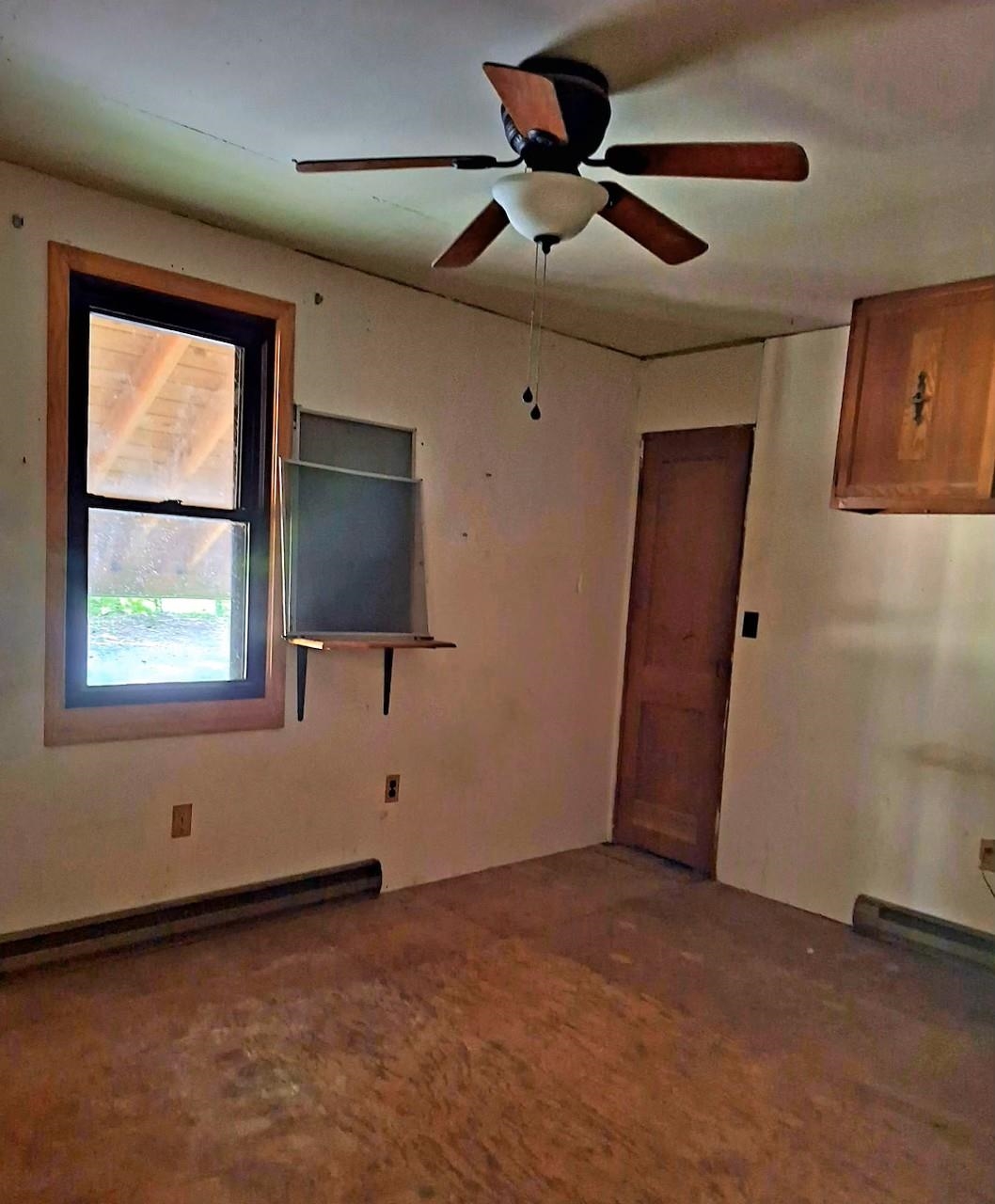 2219 Hewitt Road Swoope, VA 24479 - Photo 32 of 53 an empty room with windows and fan