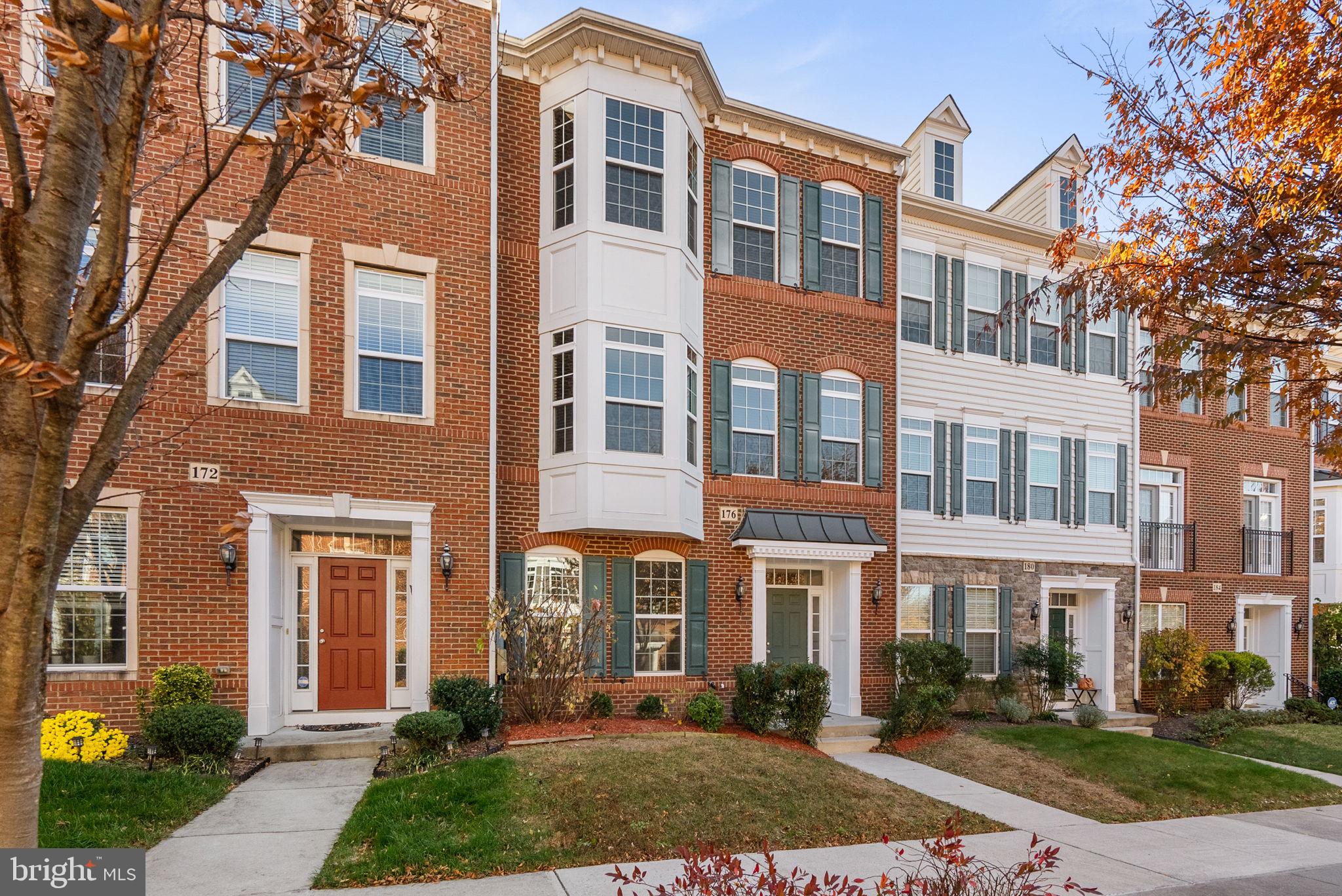 176 Autumn View Drive Gaithersburg, MD 20878 - Photo 2 of 45 front view of a brick house with a yard