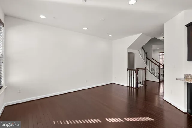 a view of entryway with wooden floor