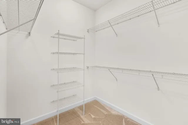 a view of a room with racks on the wall