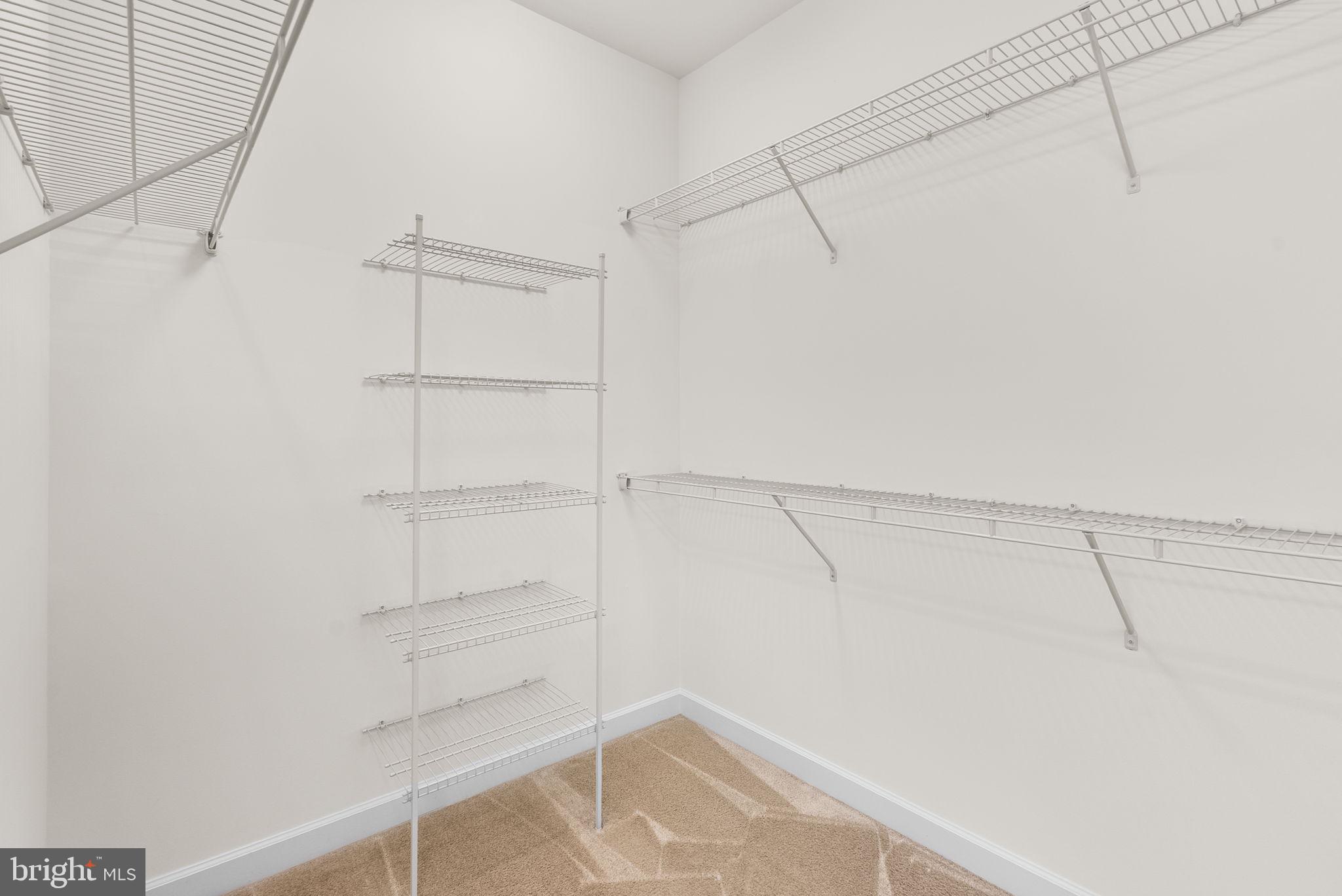 176 Autumn View Drive Gaithersburg, MD 20878 - Photo 33 of 45 a view of a room with racks on the wall