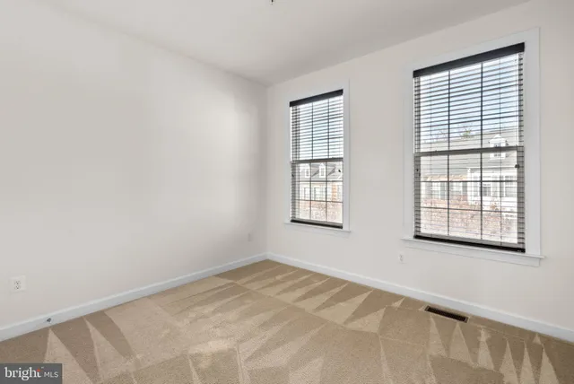 a view of a bedroom with a window
