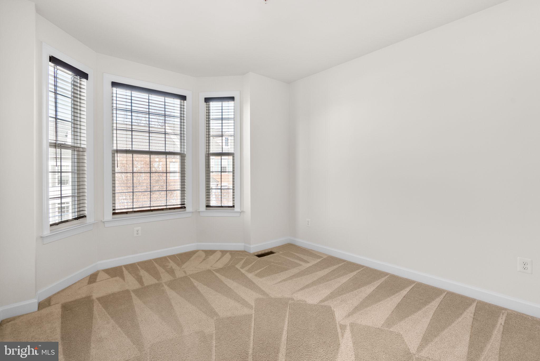 176 Autumn View Drive Gaithersburg, MD 20878 - Photo 36 of 45 a view of a bedroom with a window