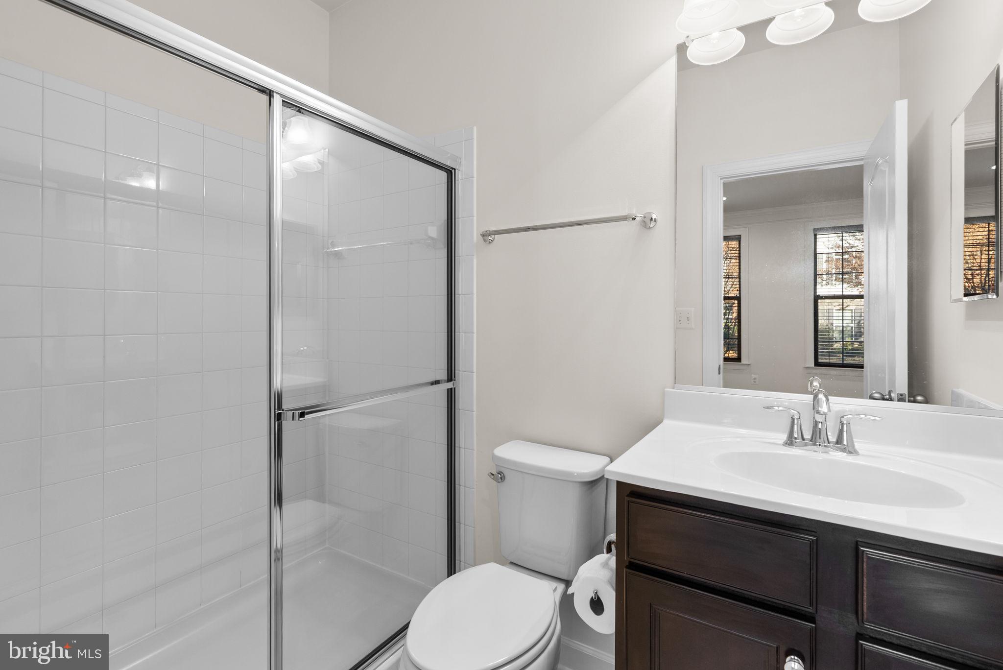 176 Autumn View Drive Gaithersburg, MD 20878 - Photo 42 of 45 a bathroom with a sink toilet and shower