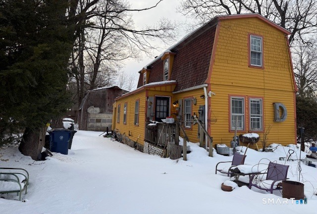 5 Charles Street Windham, CT 06226 - Photo 2 of 6 a view of a house with a patio