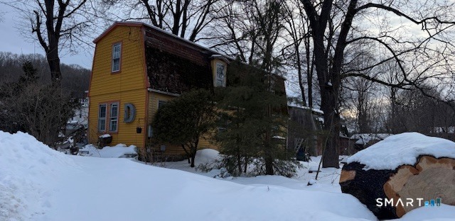 5 Charles Street Windham, CT 06226 - Photo 5 of 6 a backyard of a house with lots of green space