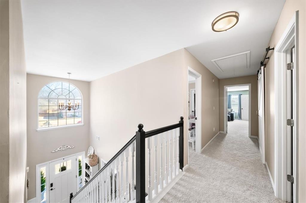 429 Farmwood Way Canton, GA 30115 - Photo 25 of 56 a view of a hallway with windows