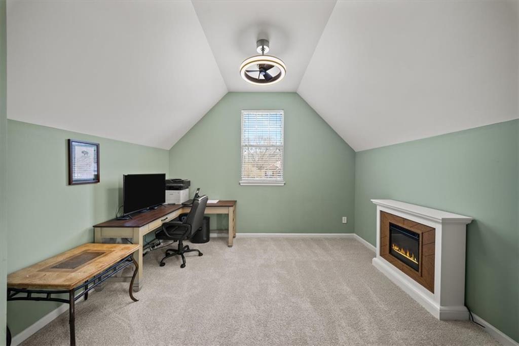 429 Farmwood Way Canton, GA 30115 - Photo 30 of 56 a view of a livingroom with workspace and a window