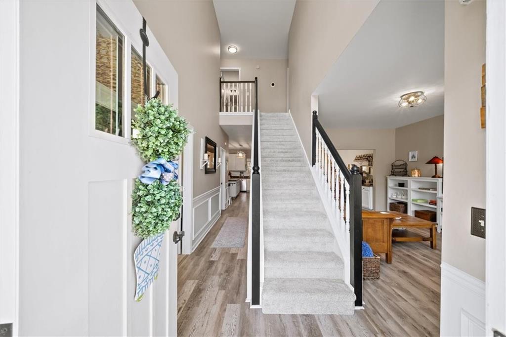 429 Farmwood Way Canton, GA 30115 - Photo 5 of 56 a view of entryway and hall with wooden floor