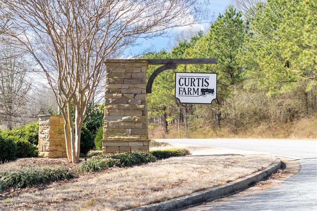 429 Farmwood Way Canton, GA 30115 - Photo 56 of 56 a sign that is on the side of a road