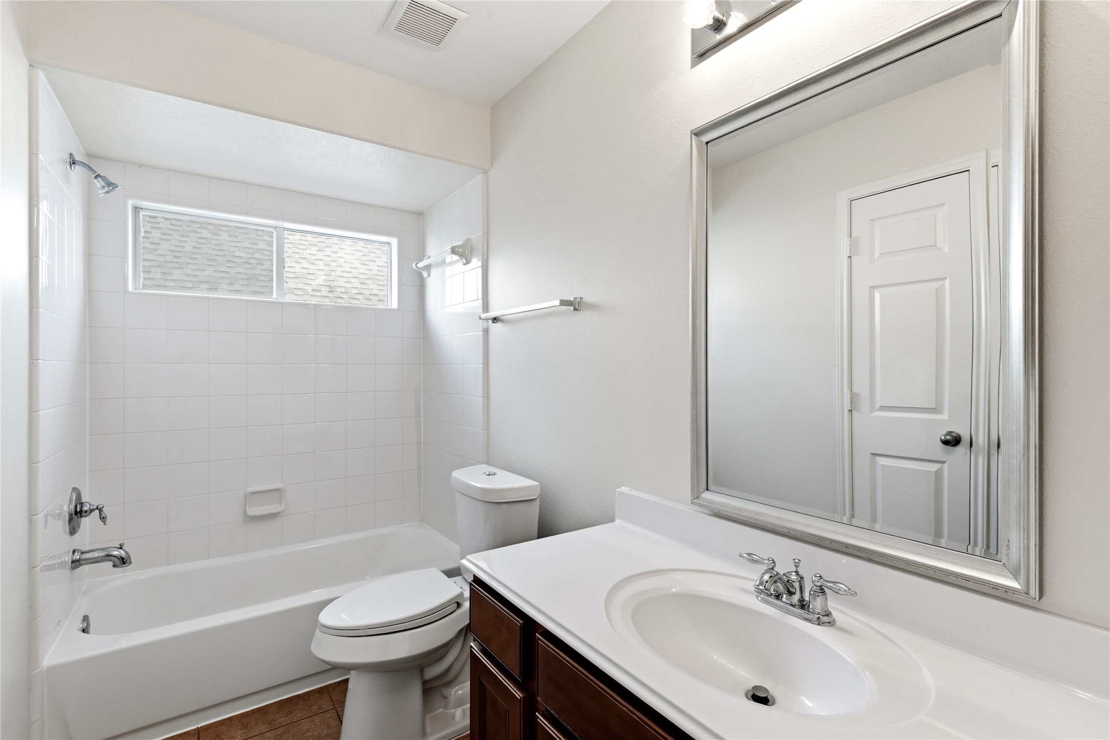 6211 Stone Hill Road Spring, TX 77389 - Photo 38 of 43 a bathroom with a sink toilet vanity and shower
