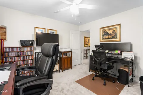 a bathroom with a sink toilet a mirror and shower