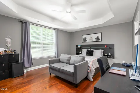 a kitchen with stainless steel appliances granite countertop a stove a refrigerator and a microwave