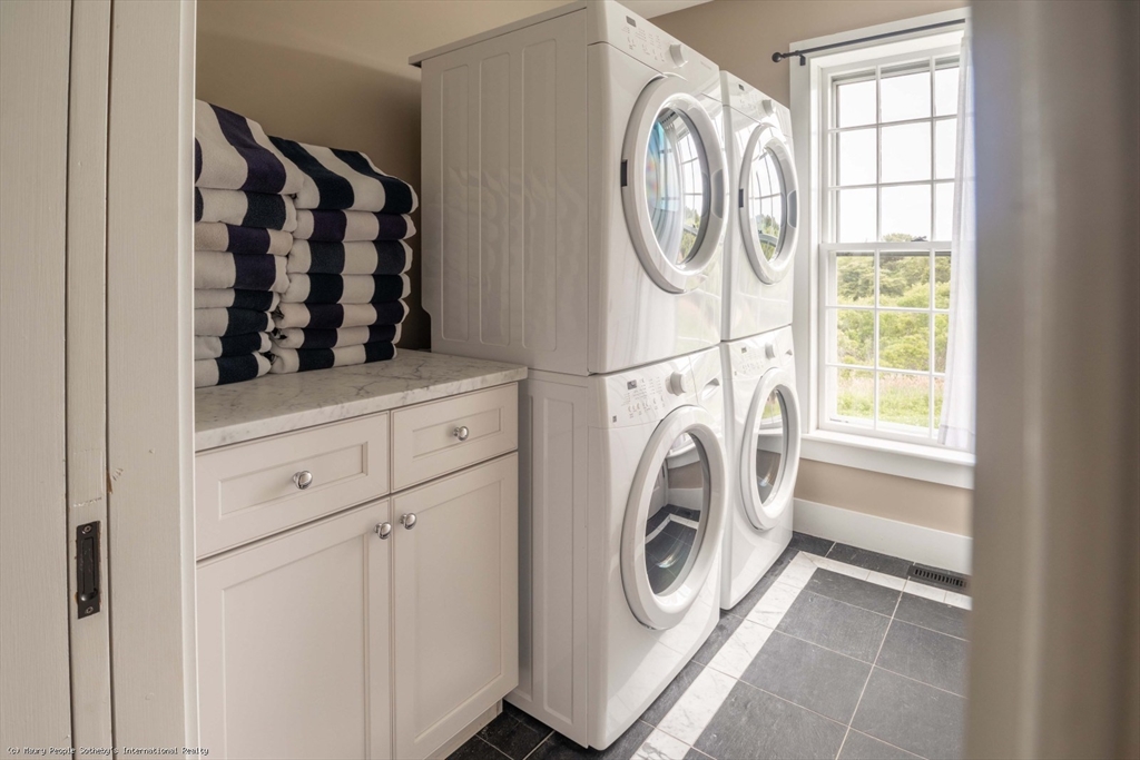 21 Quidnet Road, Unit 1 Nantucket, MA 02554 - Photo 20 of 42 a utility room with dryer and washer