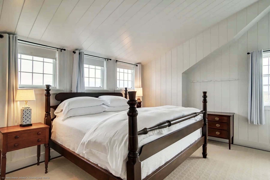 21 Quidnet Road, Unit 1 Nantucket, MA 02554 - Photo 29 of 42 a bed room with bed and window