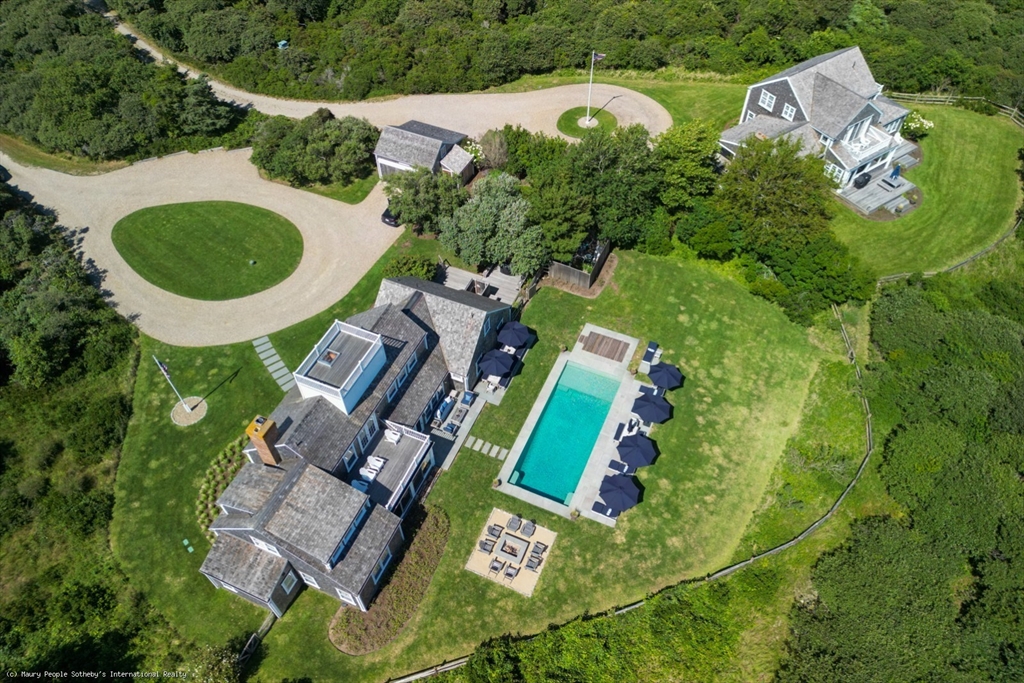 21 Quidnet Road, Unit 1 Nantucket, MA 02554 - Photo 3 of 42 an aerial view of a house with outdoor space and tennis court