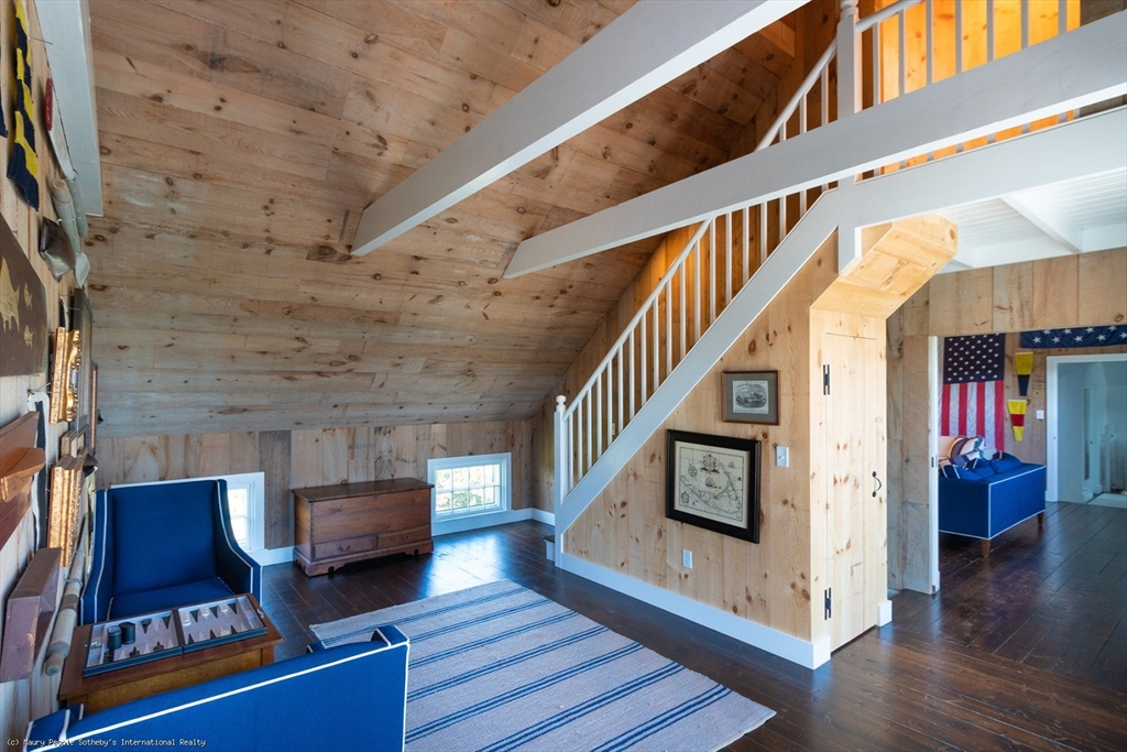 21 Quidnet Road, Unit 1 Nantucket, MA 02554 - Photo 31 of 42 a view of an entryway with wooden floor