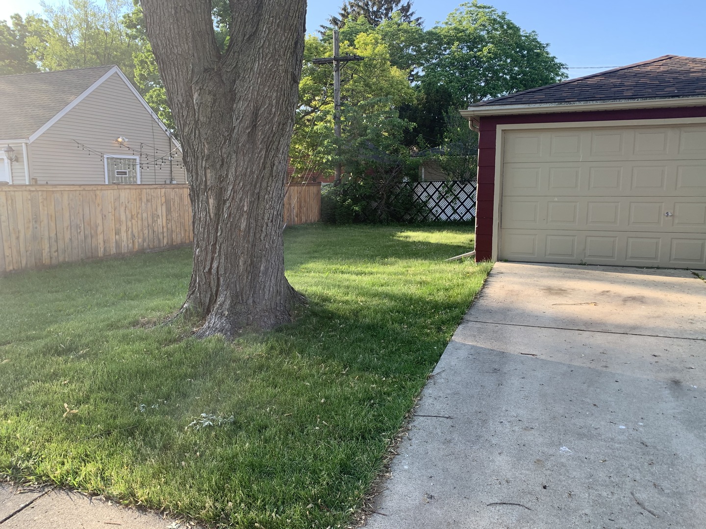 1720 South Cumberland Avenue Park Ridge, IL 60068 - Photo 4 of 26 a front view of a house with a yard and a garage