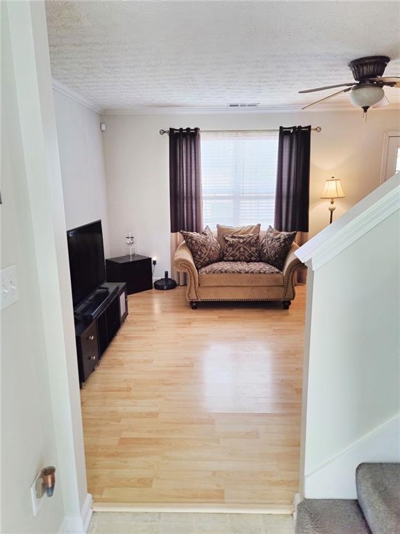 1600 Keystone Drive Conley, GA 30288 - Photo 3 of 14 a living room with furniture and a flat screen tv