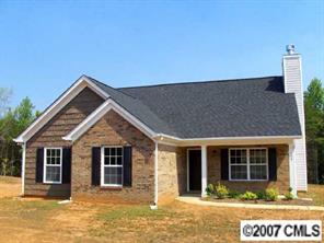 138 Rambler Lane Blacksburg, SC 29702 - Photo 1 of 8 a front view of a house with garden
