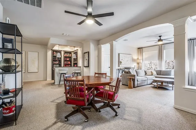 a view of a livingroom with furniture and a window