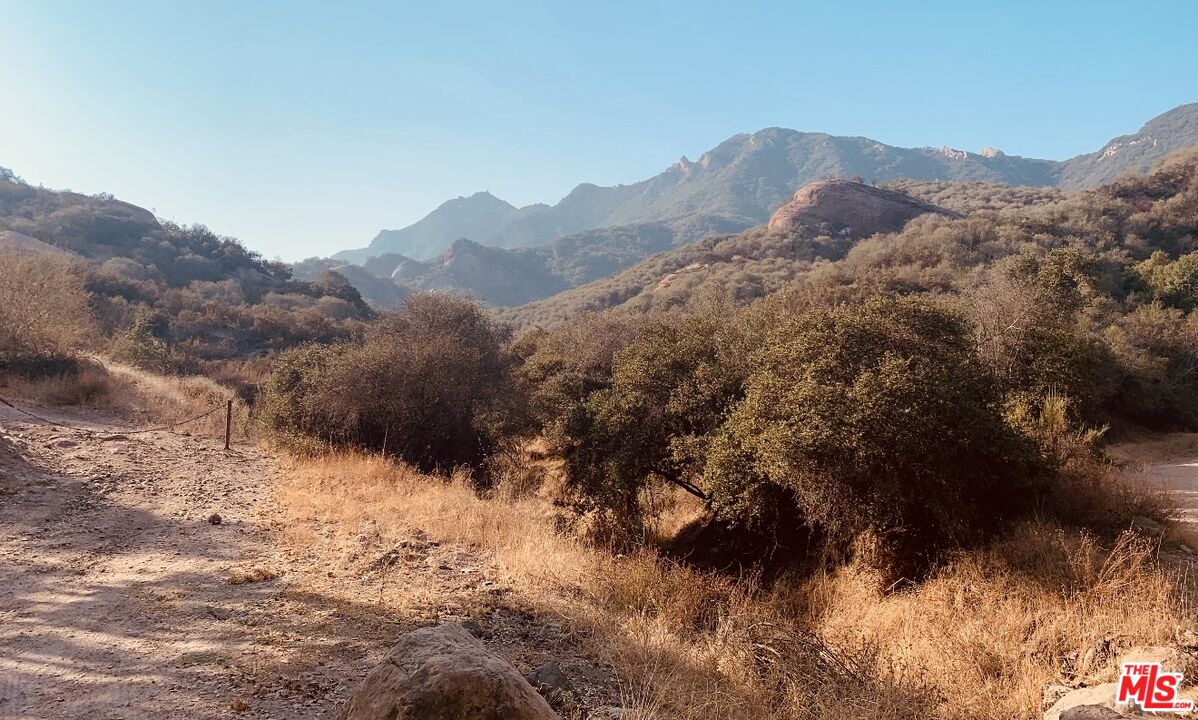 0 Red Rock Road Topanga, CA 90290 - Photo 30 of 53 a view of a dry yard with mountains in the background