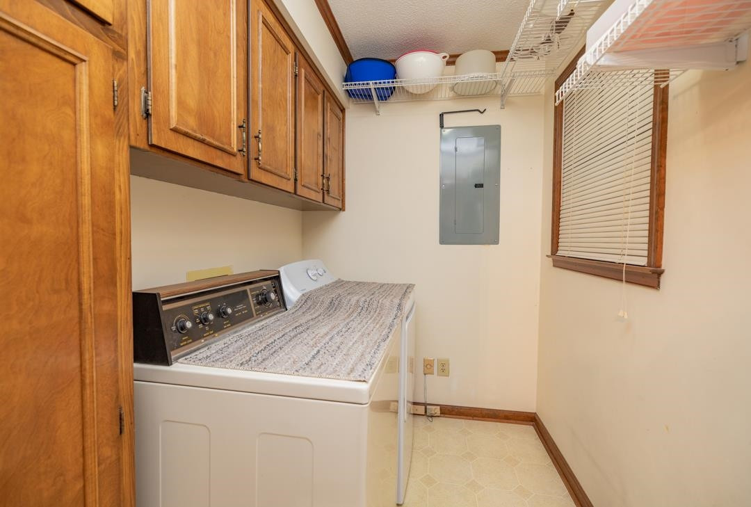 6509 Woodshire Place Raleigh, NC 27612 - Photo 27 of 30 a utility room with dryer and washer