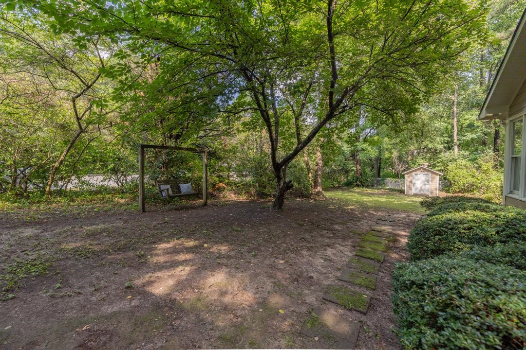 6509 Woodshire Place Raleigh, NC 27612 - Photo 5 of 30 a view of a forest with trees
