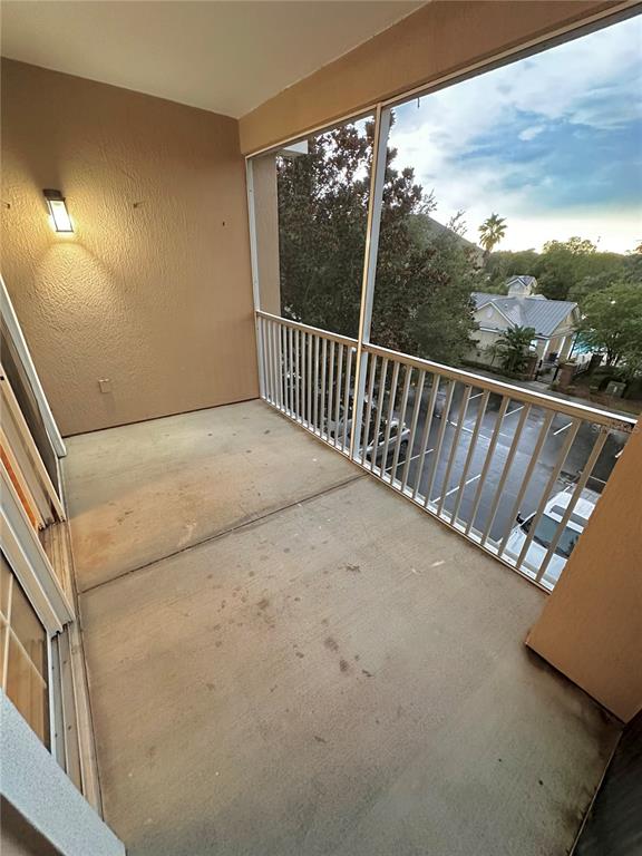3280 Soho Street, Unit 308 Orlando, FL 32835 - Photo 19 of 45 a view of balcony with furniture
