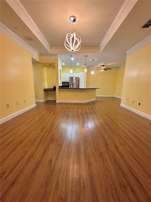 3280 Soho Street, Unit 308 Orlando, FL 32835 - Photo 20 of 45 a view of a room with wooden floor
