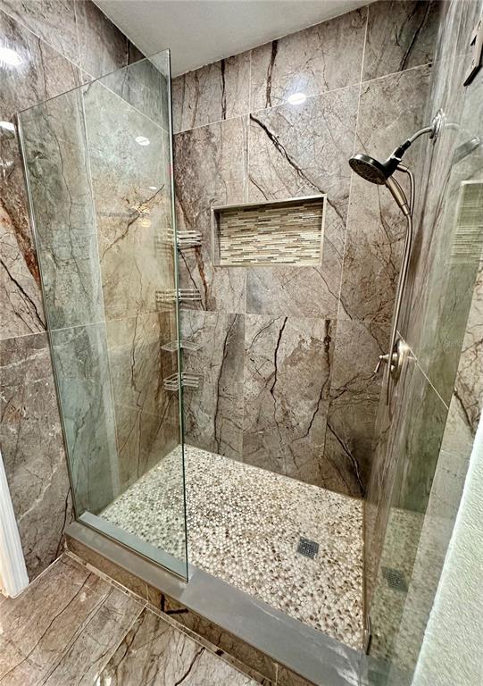 3280 Soho Street, Unit 308 Orlando, FL 32835 - Photo 26 of 45 a bathroom with a shower