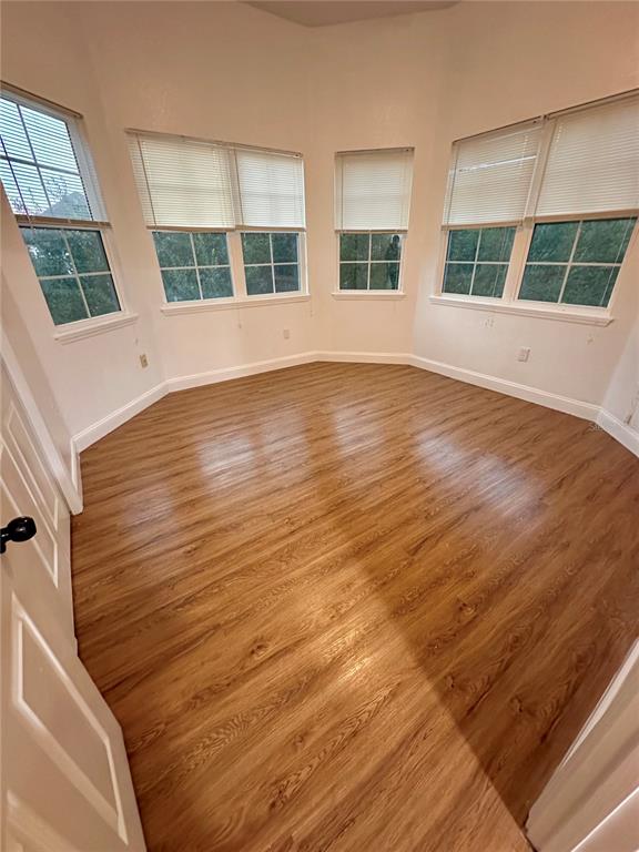 3280 Soho Street, Unit 308 Orlando, FL 32835 - Photo 28 of 45 a view of empty room with windows